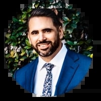 Daniel_Carriazo seen in a white color shirt and blue color suit